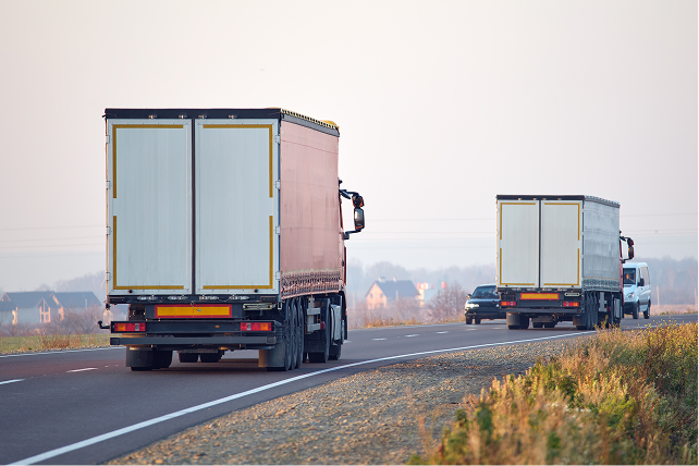 semi truck with cargo trailer driving on highway h 2024 12 06 19 01 37 utc 1