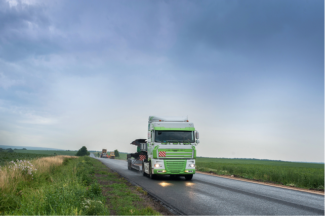 semi truck with cargo trailer driving on highway h 2024 12 06 19 01 37 utc 2